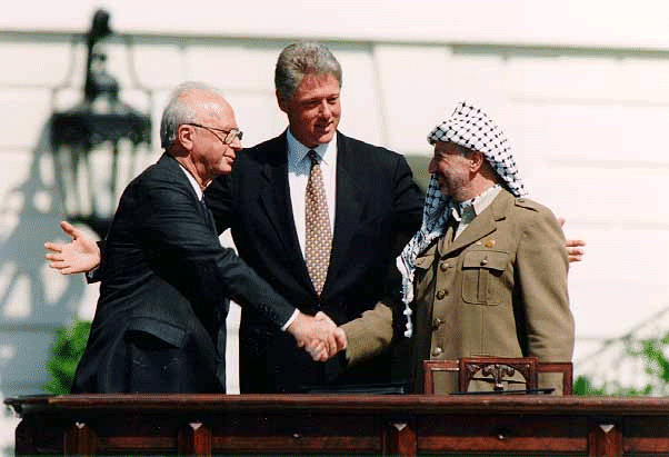 Arafat, Clinton and Rabin sign Oslo